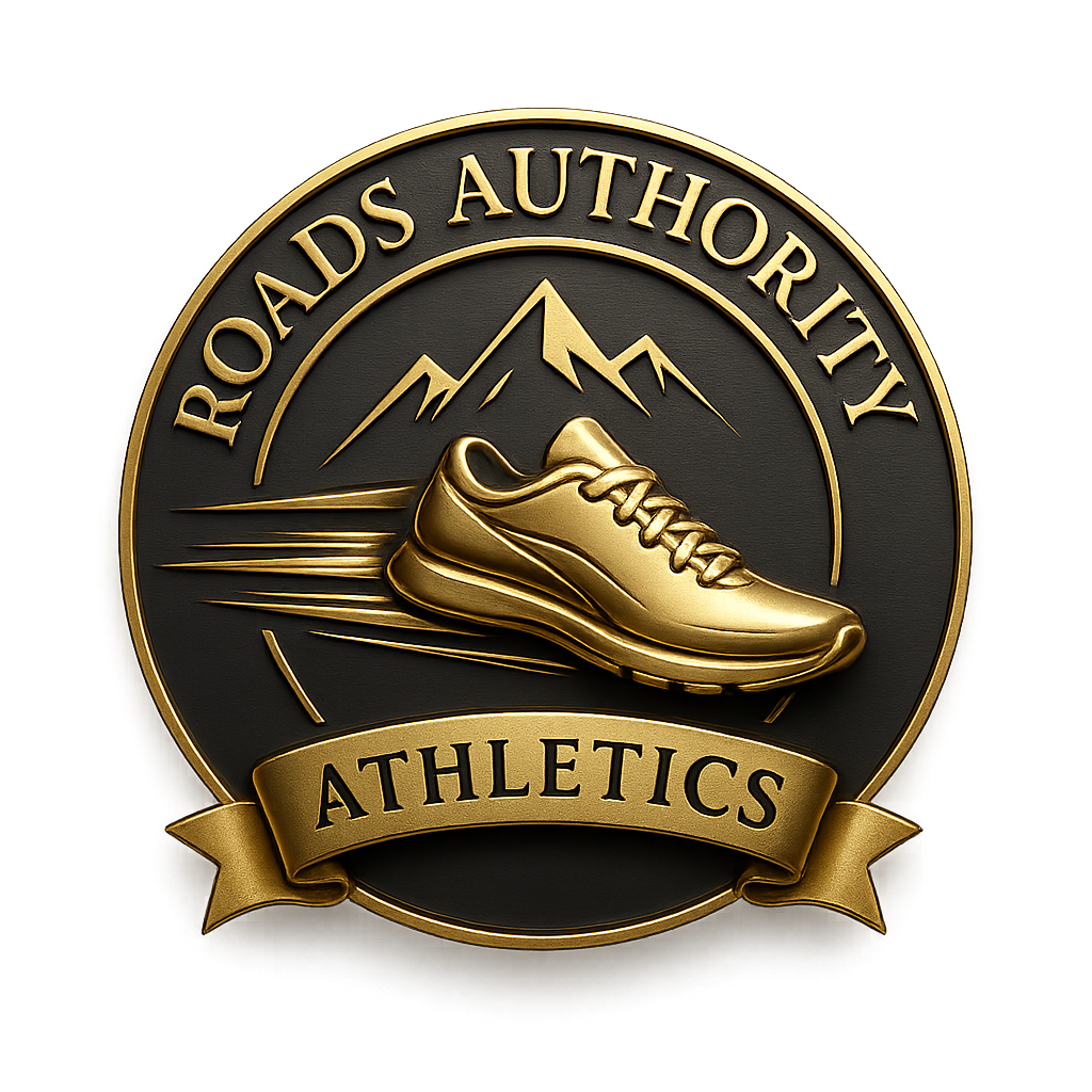 Top Arched Text: ROADS AUTHORITY (Gold Serif Font)Center Icon: An aerodynamic flying golden running shoe with velocity motion streaks crossing the mountain background. Bottom Ribbon Text: ATHLETICS